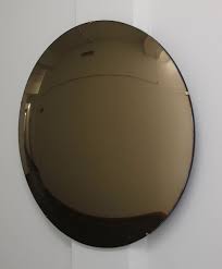 This frameless round wall mirror from betterthis frameless round wall mirror from better bevel is a classic, highly versatile design that shines in both traditional and modern interiors. Orbis Convex Bronze Tinted Round Frameless Mirror With Brass Clips Large By Alguacil Perkoff Ltd For Sale At Pamono