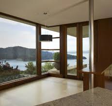 The extensive glass area creates a lighter, more open and friendlier space. Floor To Ceiling Windows Case Design Remodeling