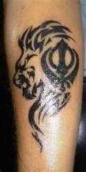 It looks as if the tiger is emerging out of the khandha in this tattoo design. 31 Ideas Tattoo Lion Head Black For 2019 Tattoo Designs Men Elegant Tattoos Tattoos