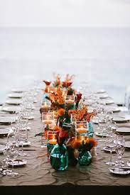 A Tropical Tablescape Destinationweddings Weddings Tablescapes Bliss Teal Wedding Centerpieces Teal Fall Wedding Fall Wedding Tables