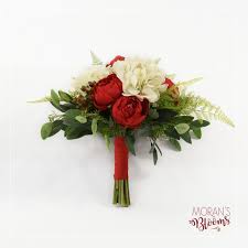 Winter wedding bouquets are becoming more popular than ever before as more and more couples are deciding to get married in the colder months of the year. Winter Bridal Bouquet Silk Bridal Bouquet Bouquet Hydrendea Bouquet Winter Bridal Bouquets Silk Bridal Bouquet Wedding Bouquets