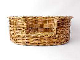 Our rattan dog and cat baskets are very robust, and more durable than the cheaper willow pet beds which can be very brittle and not last long. Oval Rattan Dog Baskets Natural Charley Chau Luxury Dog Beds Blankets
