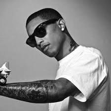 Pharrell's arms were covered in many interesting tattoos but he did not like them anymore so he got them removed. 17 Rappers With Neck Tattoos