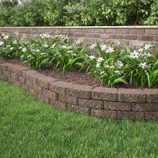 A block wall doesn't need to be just straight and flat because these blocks are very versatile. Wall Blocks Hardscapes The Home Depot