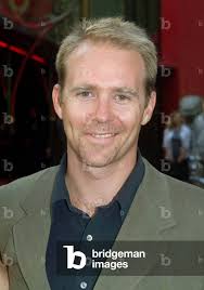 Image of Actor Jason Connery poses for photographers as he arrives for