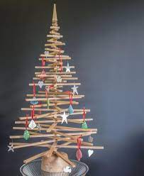 Plus, find where to get the best trees and decor this year. Alternative Oak Christmas Tree Etsy Wooden Christmas Trees Contemporary Christmas Trees Wooden Christmas