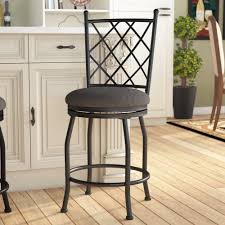 The metal ring footrest is ideal for propping your feet up while socializing or eating at your kitchen island or pub table. Fleur De Lis Living Rhoads Metal 24 5 Swivel Bar Stool Reviews Wayfair