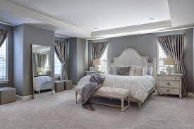 Example of a small beach style master medium tone wood floor and brown floor bedroom design in new york with gray walls. Elegant Grey Bedroom Sweet Nursery Transitional Bedroom Other By Henrietta Heisler Interiors Inc Houzz