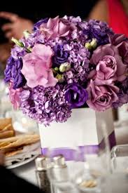 Ftd offers a wide selection of wedding flowers to say congratulations or thank you for the invite, to be used as centerpieces at a rehearsal dinner, for the bride to hold while she walks down the aisle, or any other wedding need you may have. Purple Centerpieces See How This Looks In Your Wedding Design Https Itunes Apple Flower Centerpieces Wedding Purple Centerpieces Purple Wedding Centerpieces
