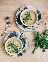 Roasted Garlic Soup With Potatoes Shallots And Fresh Herbs Recipe Garlic Soup Soup Garlic
