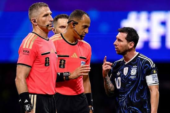  Referee Ismail Elfath was in action during the FIFA World Cup 2026  semi-final clash between England and Argentina. The experienced American  referee delivered an outstanding performance in one of the biggest