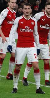 Born 27 september 1992) is a swiss professional footballer who plays as a midfielder for premier league club arsenal and captains the. Datei Granit Xhaka 2018 Jpg Wikipedia