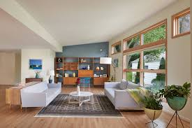 The distinct, sculptural armchair is synonymous with midcentury modern design and adds effortless style to everyday lounging. 75 Beautiful Mid Century Modern Living Room With Blue Walls Pictures Ideas August 2021 Houzz