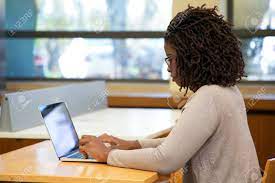 Focused African American Female Student Working On Computer In Stock Photo Picture And Royalty Free Image Image 130757864