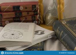 Astrology Books And Hourglass In Psychic Office Editorial