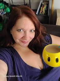 enjoying morning coffee with cat