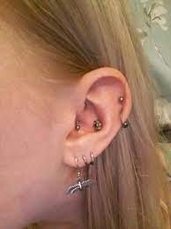 Conch Daith Double Helix And Triple Lobe Piercings Triple Lobe Piercing Ear Piercings Lobe Piercing