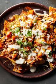 Hearty Bean Nachos With Spicy Salsa Recipe Recipe In 2020 Recipes Spicy Salsa Nyt Cooking