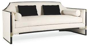Set Off Beautifully By Notched Ebonized Framework This Thoroughly Modern Sofa Enjoys Cream Colored Upholstery And Brass Schwarzes Sofa Kleines Sofa Sofa Weiss
