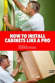 How To Install Cabinets Like A Pro Installing Cabinets Kitchen Wall Cabinets Cabinet