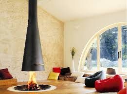 Suspended fireplaces hang from the ceiling or wall, maximising on space and possessing a unique sculptural quality. 15 Hanging And Freestanding Fireplaces To Keep You Warm This Winter