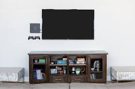 Other times people end up with their cable boxes on a table or a lot of people relocated their power outlet behind the tv when they make the decision to mount, this is the ideal situation but. How To Safely Hide Cables Behind A Wall Racksolutions