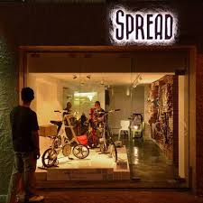 Sie waren bereits in friendly bicycle shop?teilen sie ihre erfahrung! The Sliding Shop Front Allows Events To Spill Out Onto The Street Whilst The Extendible Concrete Plinth Behind Can Be Bicycle Store Bike Shop Gift Buying Guide
