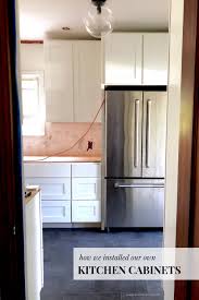 Figure out how much space you have in your kitchen and how much of it you want to cover with cabinets. How Hard Is It To Install Kitchen Cabinets The Exciting Part Of Our Diy Kitchen Reno Create Enjoy