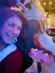 not sure who's smiles bigger?