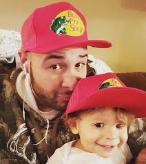 Exhausted dad sleeps under son's hospital bed after working overnight shift