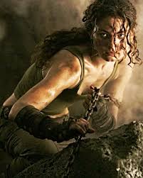 Vin diesel reprises his role as riddick and acts as producer. Chronicles Of Riddick Kyra Alexa Davalos Character Profile Writeups Org