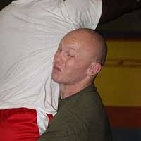 Lance Cpl. Steven T. Smiley begins to flip Cpl. Donte