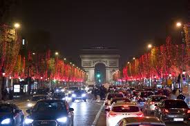 Karl Lagerfeld Turns Champs Elysees Red For The Holidays Champs Elysees Karl Lagerfeld Lagerfeld
