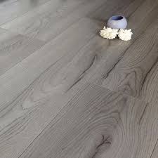 Flooring products like swiss krono will state plank thickness on their packages or in their advertising by measuring the entire plank thickness — from the bottom surface that rests on the subfloor to the top of the plank. Prestige Oak Grey 8mm V Groove Laminate Flooring 4175