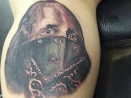 His notorious legend lives on today, and generations have come to know his name ever since the prohibition era. 26 Gangsta Tattoos For Tough Guys
