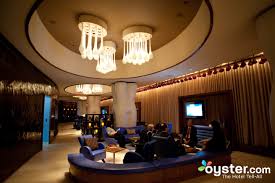Have one person support the weight of the existing fixture while the other unbolts any screws and lock nuts that attach the fixture to the ceiling. Renaissance New York Times Square Hotel Review What To Really Expect If You Stay