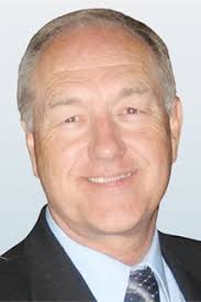 Timothy L. “Tim” Huth