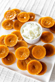 Kutsinta A Filipino Dessert An Orange Glutinous Rice Cake Topped With Grated Coconut Filipino Food Dessert Filipino Desserts Asian Desserts