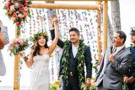 Two tier hawaiian wedding cake with sparkling cider toast (includes satin cake table and keepsake champagne flutes) 50 minute couples massage Colorful Wedding In Paradise Celebrating Hawaiian Culture Hey Wedding Lady