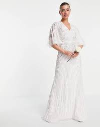 Its previous names were helsingin puhelin (until july 2000) and elisa communication oyj. Asos Wedding Eliza Verziertes Hochzeitskleid Mit Flatterarmeln Asos