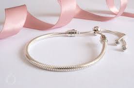Grasp the bracelet gently on either side of the clasp bead, and press your thumbnail into its slit with enough pressure to pop the hinged clasp open. How To Unlock Pandora Bracelet Promotions