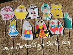 At her engagement party, she escapes the crowd to consider whether to go through with the marriage and falls down a hole in the garden after spotting an unusual rabbit. Diy Alice In Wonderland Photo Booth Props Diy Idea For Your Own Party The Iced Sugar Cookie