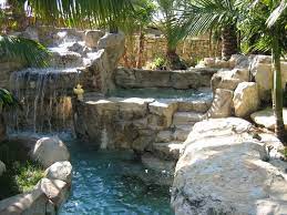 Our designs reflect our desire to bring joy to you and your family. Rock Pool With Lazy River Tropical Garden Style Kolonialstil Pools Los Angeles Von My Garden Landscape Design By Wayne Houzz
