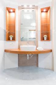 The countertop floating basin shelf from lusso is a luxurious design, perfect for added storage in a modern bathroom. Modern Bathroom With Countertop Basin Mirror And Built In Wall Stock Photo Picture And Royalty Free Image Image 60772053