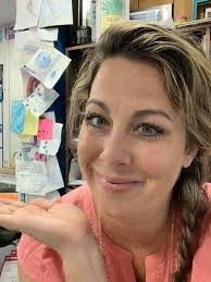 Students draw pictures of their teacher