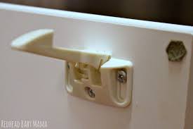 This collection of cabinet and kitchen latches are available in various styles and finishes. How To Install Safety 1st Spring Loaded Cabinet Drawer Latches Redhead Baby Mama Atlanta Blogger