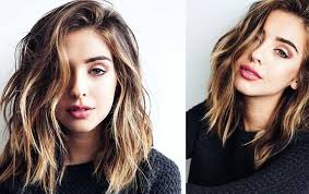 Think of this as long layers, with a twist, incorporating the same type of curtain bangs that define the modern shag. Hairstyles For Women Best Haircuts For Women Medium Haircuts Storytimes