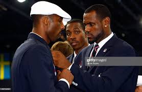 Basketball Player Lebron James Of The United States Adjust The Tie Of Kobe Bryant Lebron James Basketball Nba Lebron James
