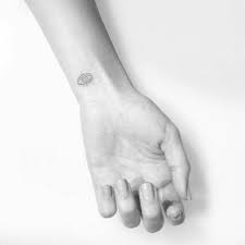Beautiful evil eye on hand tattoo on upper back. Evil Eye Tattoo On The Wrist