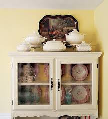 In this case, while the wood was beautiful, dark wood in such large pieces like china cabinets can make a dining room, living room, or craft room (places where people typically put china cabinets) feel very heavy. Dining Room China Cabinet Makeover A Cultivated Nest